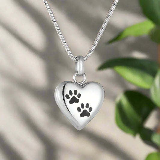 Collier avec urne commémorative pour animaux de compagnie – Pendentif en forme de cœur avec gravure de patte